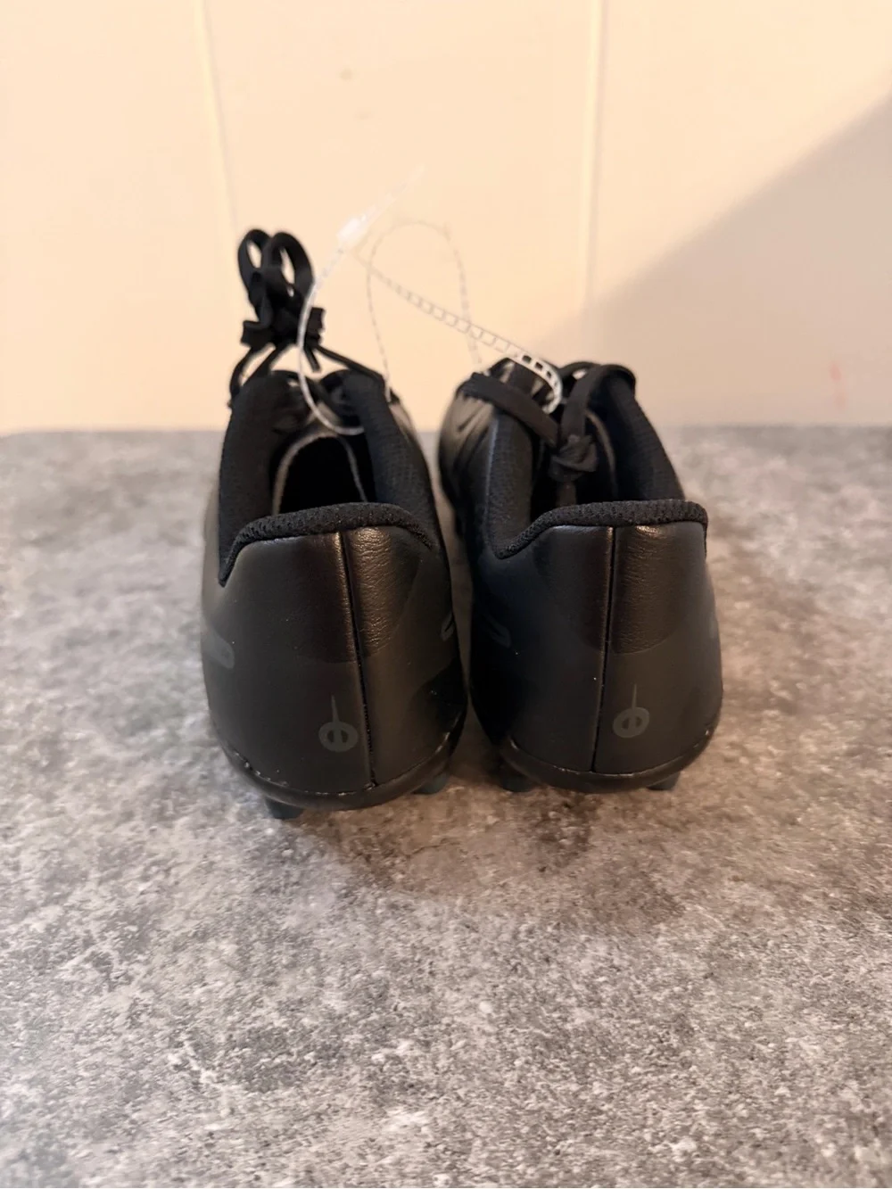 Nike Kids Black Soccer Cleats with Subtle Dark Swoosh